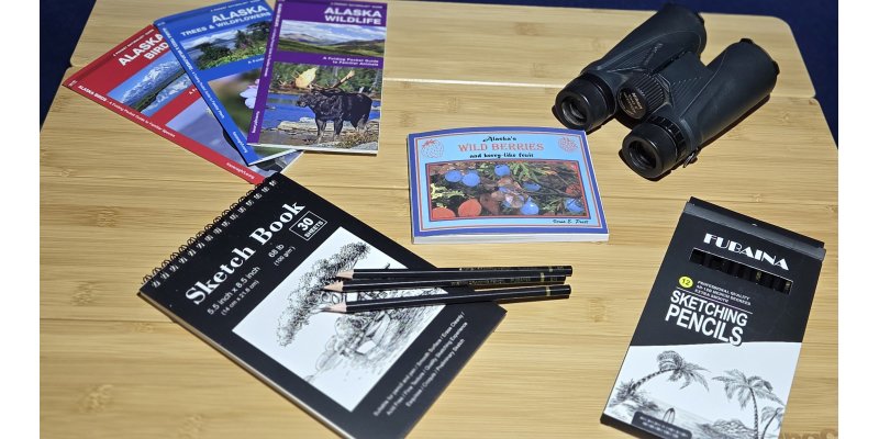 Denali Backroads Alaska Naturalist Kit with binoculars sketchbook and field tools for wildlife viewing and outdoor exploration