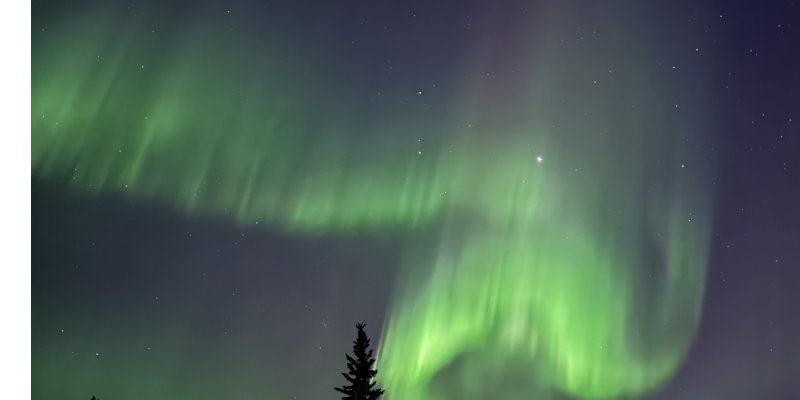 Aurora Borealis viewing at Cleary Summit high elevation pullout along the Steese Highway near Fairbanks Alaska