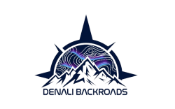 Denali Backroads logo with mountain peaks, compass shape and Northern Lights design representing Alaska adventure rentals.